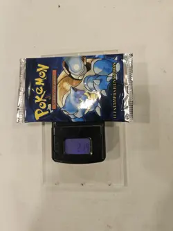 HEAVYU! 21.4g PORTUGUESE 1999 Pokemon Base Set Pack - Image 1