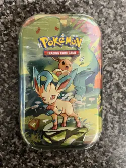 Pokemon TCG Scarlet & Violet Prismatic Evolutions Mini Tin (Leafeon) Sealed - Image 1