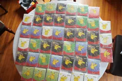 Pokemon 25th Anniversary Booster Packs LOT OF 55, McDonald's LOT OF 53 - Image 1