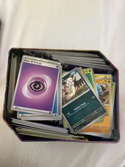 Pokemon Tin With Lot Of Bulk - Image 3