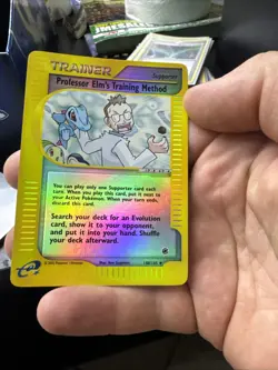 Pokemon Card - Professor Elm's Training Method Expedition 148/165 Reverse Holo - Image 1