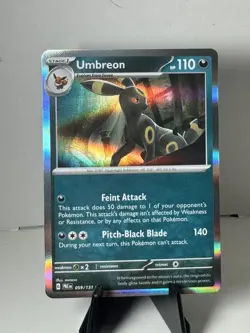 Pokemon TCG Umbreon 059/131 Prismatic Evolutions Rare Holo Poke Ball Pattern NM - Image 1