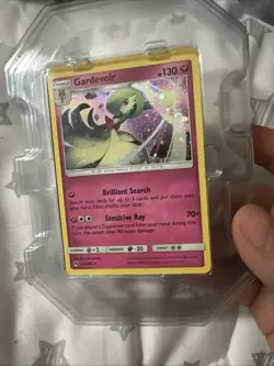 Gardevoir (Cosmos Holo) SM Lost Thunder 141/214 Pokemon Card NM SWIRL - Image 1
