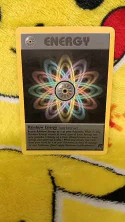 Vintage 1999-2000 Pokemon Team Rocket Rainbow Energy NM - Image 1