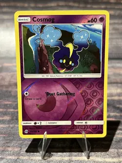 Cosmog 64/149 Reverse Holo Sun & Moon Base Set Pokemon Card - Image 1