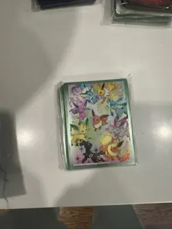 Eevee Card Sleeves From Pokemon Prismatic Evolutions SPC (65 Sleeves Total) - Image 1