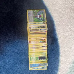 Nintendo Pokemon TCG Mixed Card Lot English Standard Size Card Stock - Image 1