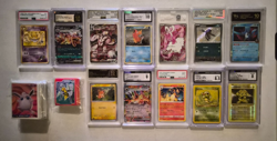 Pokemon 12 Slab lot. 7 Graded Gem Mint 10 plus 215 stickers - Image 1