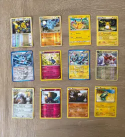 Lot Of 12 Holo Pokemon Cards EEVEE PIKACHU RAICHU AGGRON - Image 1