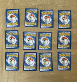 Lot Of 12 Holo Pokemon Cards EEVEE PIKACHU RAICHU AGGRON - Image 2