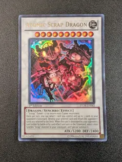 Atomic Scrap Dragon STOR-EN043 Ultra Rare 1st Edition Yugioh MP/LP - Image 1