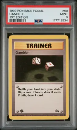 1999 POKEMON FOSSIL 1ST EDITION #60 GAMBLER PSA 9 - Image 1