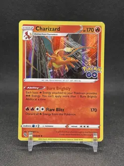 POKEMON CHARIZARD #010/078 RARE HOLOFOIL NM POKEMON GO CARD - Image 1