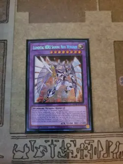YUGIOH ELEMENTAL HERO SHINING NEOS WINGMAN MP24-EN062 PRISMATIC SECRET 1ST NM - Image 1