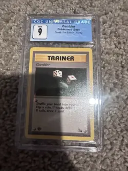 1999 Fossil 1st edition CGC 9 The Gambler Pokemon Card #60/62 - Image 1