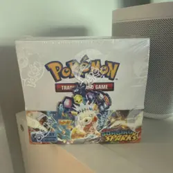 Pokemon TCG: Surging Sparks Booster Box Sealed - Small Tear - Image 1