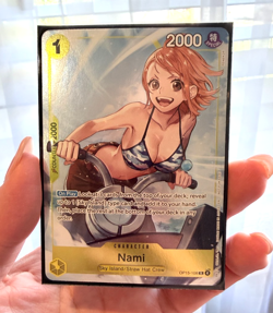 One Piece TCG ENGLISH Nami OP15-108 DASH PACK PROMO Adventure On Kami’s Island - Image 1