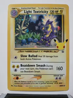 PROMO Light Toxtricity SWSH137 NM - HOLO Celebrations Pokemon Card Naoyo Kimura - Image 1