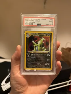 2001 POKEMON NEO DISCOVERY 1ST ED #12 TYRANITAR-HOLO PSA 9 - Image 1