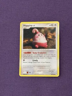 Happiny 52/123 Yuka Morii Pokemon TCG - Image 1