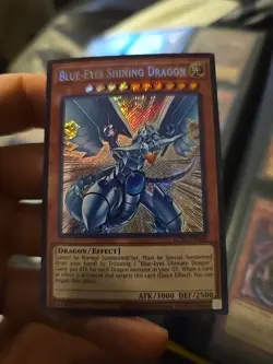 Yugioh! NM Blue-Eyes Shining Dragon - LCKC-EN008 - Secret Rare - Unlimited NM - Image 1