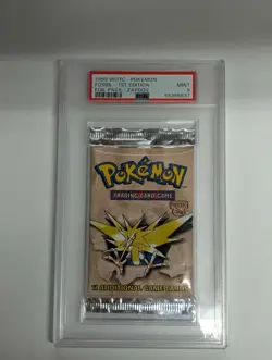 Pokemon Fossil 1st Edition Booster Pack Graded PSA 9 - Image 1