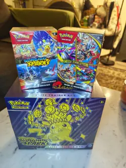 Pokemon Surging Sparks ETB + Booster Bundle Surging Sparks & Mega Evolution - Image 1