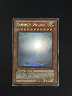 Yugioh Rainbow Dragon TAEV-EN006 1st Edition Ghost Rare - Image 1
