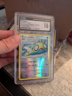TOP POP 3) CGC 10 GEM Pokemon Mysterious Treasures 47/123 Dunsparce Reverse Holo - Image 1