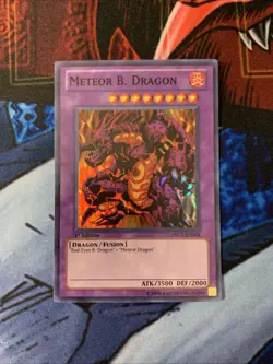 Yugioh! Meteor B. Dragon PRC1-EN004 Super Rare 1st Edition NM/M - Image 2
