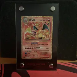 A Pokemon Charizard 25th anniversary card Chinese with a case and stand ￼ - Image 1
