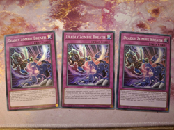 3 x Deadly Zombie Breath MZMU-EN010 - Super Rare - 1st Edition YuGiOh Playset NM - Image 1