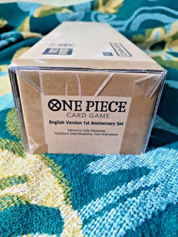 One Piece - 1st Anniversary Set FACTORY SEALED - One Piece TCG - Image 1