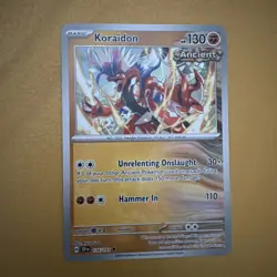 Pokemon Card Koraidon Surging Sparks Reverse Holo 116/191 Near Mint - Image 1
