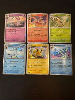 Eevee Evolutions Holos Set of 6 Prismatic Evolutions English Pokemon Cards - Image 1