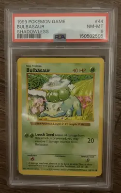 1999 POKEMON BASE SET SHADOWLESS #44 BULBASAUR PSA 8 - Image 1