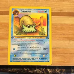 Pokemon Omanyte Fossil Set 52/62 1st Edition Regular Common 40 HP English 1999 - Image 1