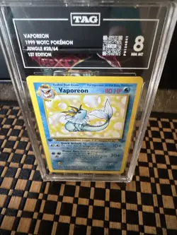 1999 POKEMON JUNGLE 1ST EDITION #28/64 VAPOREON TAG 8 - Image 2