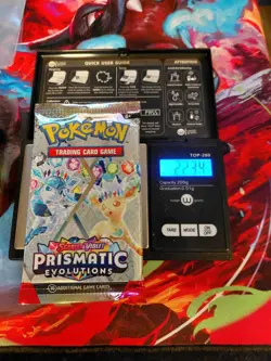 Pokemon Scarlet & Violet Prismatic Evolution Booster Pack 22.34 grams - Image 1