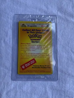 Dragonite Pokemon WB Gold Stamped 1999 First Movie Black Star Promo Sealed. - Image 1