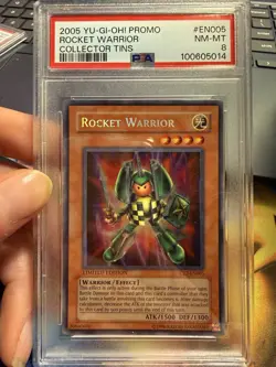Yu-Gi-Oh! Rocket Warrior Secret Rare 2005 Tin Limited Ed PSA 8 W/ PRINT ERROR🔎 - Image 1