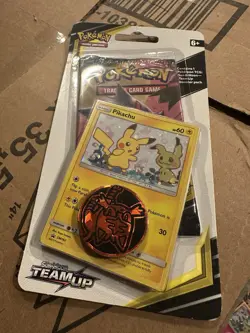 Pokemon Sun & Moon Team Up Booster Pack with Pikachu Promo Card and Coin - Image 1