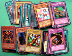 100+ YU-GI-OH CARDS IN A TIN - CARDS ARE UNCHECKED - SLIGHT WEAR TO CORNERS - Image 2