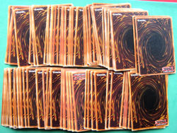 100+ YU-GI-OH CARDS IN A TIN - CARDS ARE UNCHECKED - SLIGHT WEAR TO CORNERS - Image 3