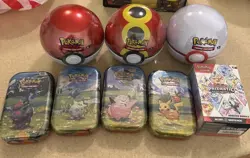 Pokemon TCG Lot W/ Prismatic, 3 Balls, 4 Tins And 1 Double Pack With Pong Coin - Image 1