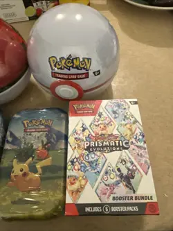 Pokemon TCG Lot W/ Prismatic, 3 Balls, 4 Tins And 1 Double Pack With Pong Coin - Image 4