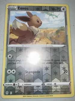 POKEMON EEVEE 125/203 REVERSE HOLO EVOLVING SKIES MP-LP RAYQUAZA IN BACKGROUND - Image 1