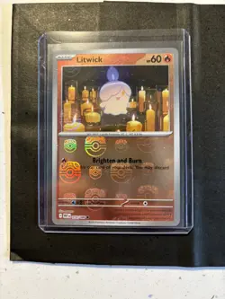 Pokemon TCG Litwick 016/086 Masterball Reverse Holo White Flare - Image 1