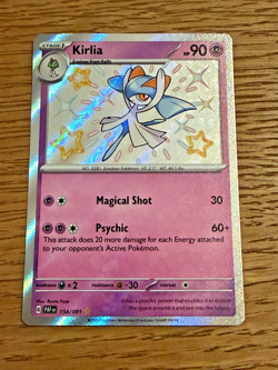 Pokemon TCG - Kirlia 154/091 - Scarlet & Violet Paldean Fates - NM - Baby Shiny - Image 1