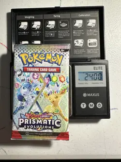 Pokemon Prismatic Evolutions Booster Pack -HEAVY 24.0g- Possible Demi/God Pack! - Image 1